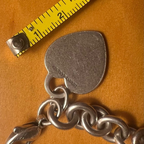 Tiffany and Co. 8” Sterling Silver Bracelet with a 1” Charm. - Picture 3 of 11